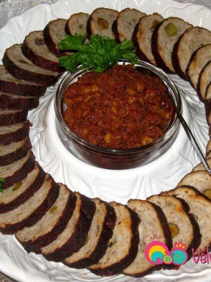 Garnish with parsley leaves and add Muhammarah in the center.