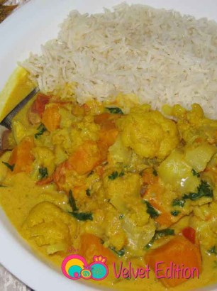 Cauliflower sweet potato coconut curry served with Basmati rice.