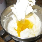 In order to get a smooth texture to your cake add the eggs one by one to the sugar and butter mixture.