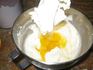 In order to get a smooth texture to your cake add the eggs one by one to the sugar and butter mixture.