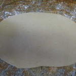 After making the dough, roll it half of it out on a lightly floured surface. Remember to follow the same steps for the other half later.