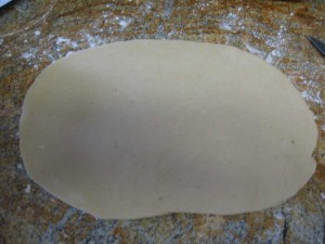 After making the dough, roll it half of it out on a lightly floured surface. Remember to follow the same steps for the other half later.