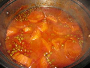 The sauce has thickened slightly and the potatoes have become soft and tender too.