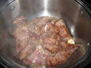 Continue adding all the steaks to the pan.