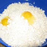 Add eggs to shredded Cotija or Panela cheese