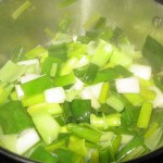 Notice how the leeks have wilted after a few minutes of sautéing.