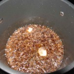 Add the spices and butter to the meat.