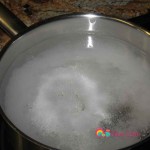 In a saucepan boil some water and add 1 tablespoon water. Remove saucepan from heat.