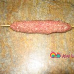 Shape meat 5 inches long using a skewer.