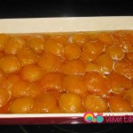 Repeat these steps with the rest of the apricots, layering and boiling them in batches. Add them to the apricots in the baking pan.