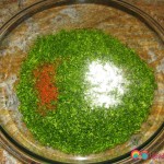 Parsley chopped finely and salt and red pepper is added. As an alternative you can add the salt and red pepper to the dressing.