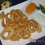 Drain the calamari on a paper towel then place on you serving platter accompanied with your favorite dipping sauce, such as tartare sauce.