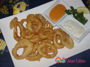 Drain the calamari on a paper towel then place on you serving platter accompanied with your favorite dipping sauce, such as tartare sauce.