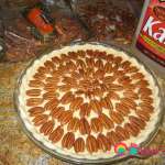 Arrange the pecans over the filling in a concentric pattern.