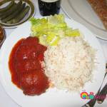 Beef patties in tomato sauce served with jasmine rice and a salad with lemon mint dressing.