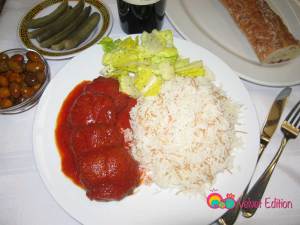 Beef patties in tomato sauce served with jasmine rice and a salad with lemon mint dressing.