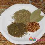 On a small plate prepare the thyme, oregano, red pepper flakes, and bay leaves.