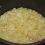 Lightly fry the chopped onions for a few minutes until they turn translucent.