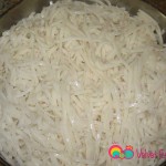 1 packet rice noodles prepared according to the package. Drizzle lightly with toasted sesame oil and set aside.