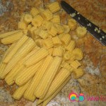 Cut the baby corn into 1/4 inch slices.