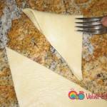 Fold and with a fork crimp the shorter side together.