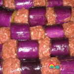 To ensure even cooking shape the beef in the same shape as the eggplants. Coat the kebabs lightly with vegetable oil.