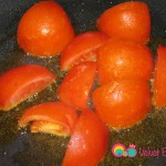 Cut the tomatoes into quarters and add melted butter in the skillet.