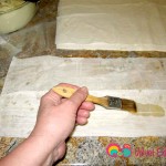 Spread some butter over the part that you just folded over.