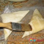Brush the top with butter and place on a tray.