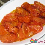 Place the stewed tomatoes in a separate serving platter. Set aside and keep warm.
