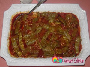 Serve Romano beans in tomato sauce with a side order of rice.