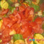 Add the chopped tomatoes. Gently mix everything together.