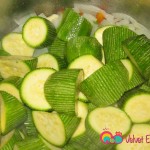 Add the zucchinis to the saucepan and toss for about 5 - 7 minutes.