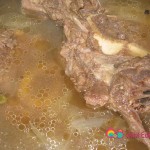 Continue to cook until the meat is fully cooked, tender and the meat falls off the bones.