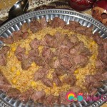 Place the bulgur pilaf and arrange the beef chunks over the top.