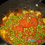 Add the tomato sauce mixture to the chicken.