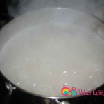 Add the rice to the boiling water and bring to another boil.