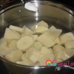 Add the salt to the potatoes, cover and boil.
