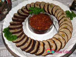 Garnish with parsley leaves and add Muhammarah in the center.