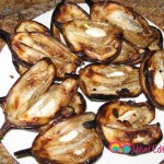 Place the broiled eggplants on a plate and set aside while you prepare the sauce.