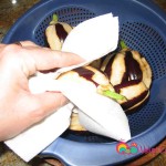 Rinse the eggplants and dry them using a paper towel.