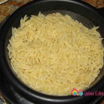 Cook orzo pasta according to package.
