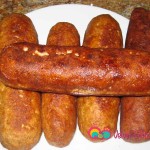 Set the cooked chicken logs onto a plate.