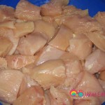 Cut the chicken breasts into 1/4 inch pieces.