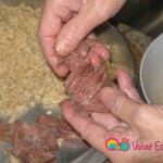 Pull the cooked meat apart into fine shreds.