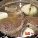 Add the beef shanks to the broth.
