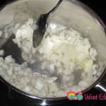 Heat the vegetable oil in a small saucepan and add the chopped onions.