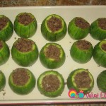 Fill each zucchini with the meat filling.