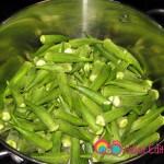Add the okra to the hot oil.